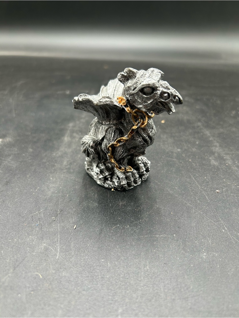 Decorative Gray Dragon or gargoyle figurine with chain